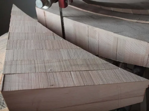A close-up of a Vista 3-Way Horn Speakers cutting through a stack of wood planks, highlighting the wood texture and saw blade. A close-up of a Vista 3-Way Horn Speakers cutting through a stack of wood planks, highlighting the wood texture and saw blade.