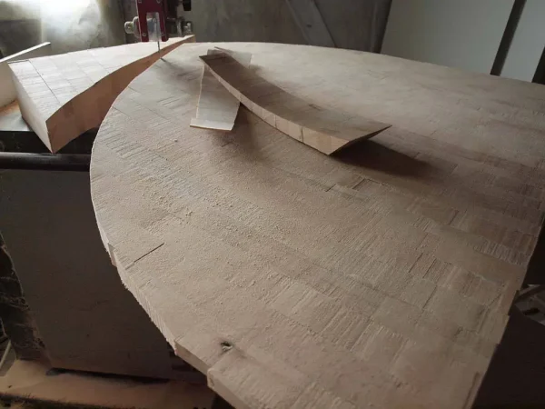 A Vista 3-Way Horn Speakers under construction with thin wood shavings and templates on it, situated in a Destination Audio workshop setting. A Vista 3-Way Horn Speakers under construction with thin wood shavings and templates on it, situated in a Destination Audio workshop setting.